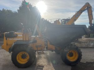 2007 Barford SK10 dumper truck with yellow and black color scheme and large front bucket.